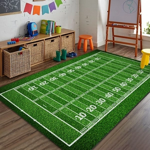 Detail of creative American football field area rug on wooden floor in cozy playroom