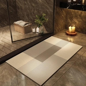 Close-up of modern striped absorbent bath mat in a luxury bathroom setting