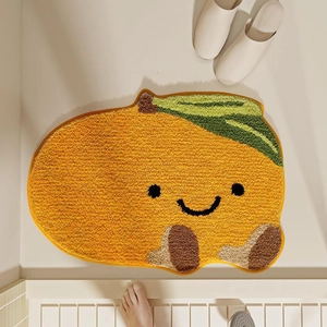 Détail d'un tapis mangue en cachemire imitation avec texture antidérapante et design mignon