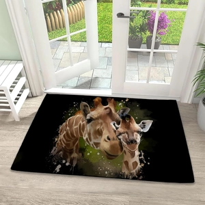 Close-up of a rectangular giraffe family art mat on a light wood floor by a door