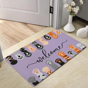 Absorbent diatomite floor mat with purple cat paw patterns and welcome script detail