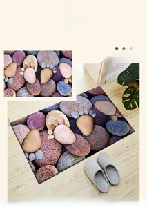 Detailed close-up of 3D pebble print indoor mat on wood floor with home accessories