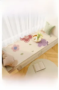 Waterproof leather bay window mat with floral pattern and scalloped edge detail