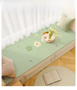 Detail of mint green waterproof leather bay window mat with elegant floral patterns