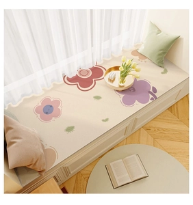 Detail view of cream waterproof balcony mat with cartoon flower patterns and leather texture