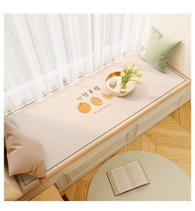 Detail of waterproof leather window mat with orange patterns and Happiness text