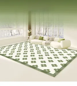Detail view of large green and white floral area rug for living room floor decoration