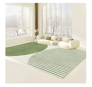 Detail view of modern green geometric area rug with soft stripes in a stylish living room