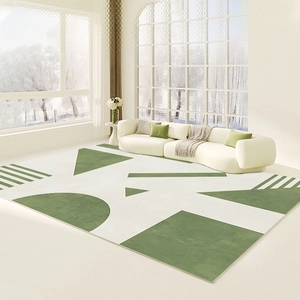 Modern olive green and cream geometric area rug for minimalist living room decor