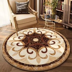 European vintage round rug with marble pattern on dark herringbone wood flooring