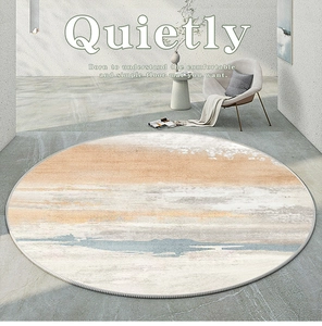 Detailed close-up of abstract round rug with orange and grey accents on industrial floor