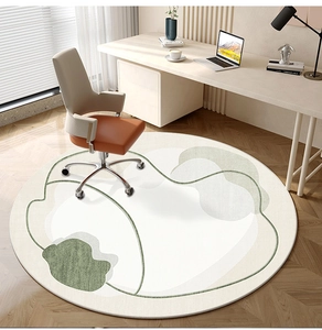 Modern abstract round rug with green waves in a minimalist home office setting