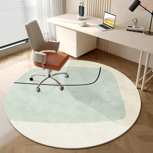 Modern geometric round area rug in light green and cream white for home office or bedroom