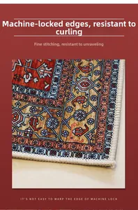 Detail of machine-locked edges on vintage Persian rug with red and navy floral patterns