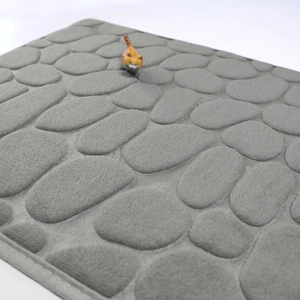 Grey coral fleece bathroom mat with 3D embossed pebble texture and non-slip backing
