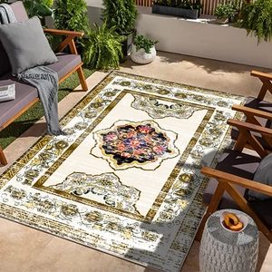 Persian style living room rug with floral patterns and ornate central medallion on balcony
