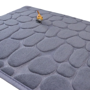 Dark grey pebble embossed memory foam bath mat with water-absorbent 3D texture
