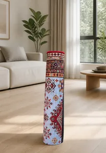 Vertical rolled outdoor picnic mat with Persian patterns next to a red bear statue