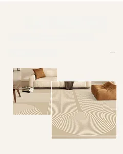 Detail of minimalist beige rug showing geometric line patterns and reinforced stitched edges