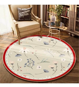Close-up of American vintage floral round rug with pink flowers and red wavy border