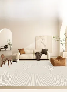 Detail of minimalist beige geometric carpet with curved lines in modern living room setting