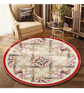 Detailed close-up of a vintage round floral carpet featuring red edges and classic patterns