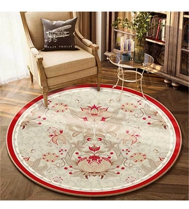 Detail of round vintage floral rug with pink flowers and classic scroll patterns