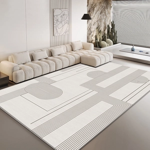 Minimalist beige geometric area rug with grey circular lines for a modern living room decor