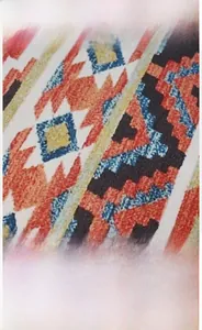 Macro view of crystal velvet carpet showing vintage Bohemian geometric pattern details