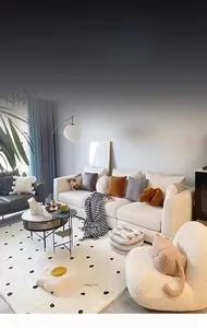 Détail du tapis en cachemire synthétique crème à pois noirs avec bord en forme d'œuf