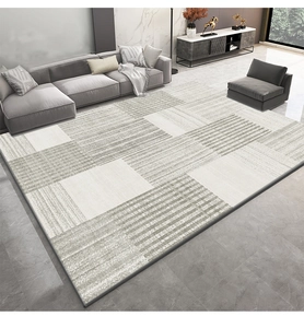 Détail d'un tapis géométrique moderne avec rayures dans un décor de salon chic