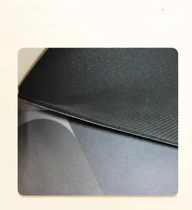 Detail view of smooth precision-cut edges and anti-slip rubber texture on the kitchen mat