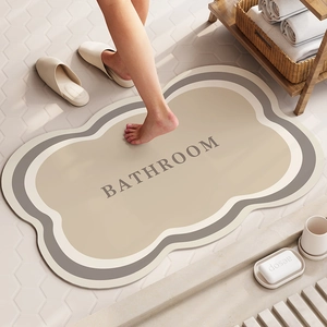 Minimalist cloud-shaped diatom mud bath mat with non-slip texture and absorbent surface