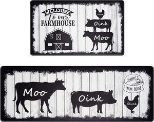 Close-up of non-slip farmhouse cow kitchen rugs with rustic wood texture and animal patterns