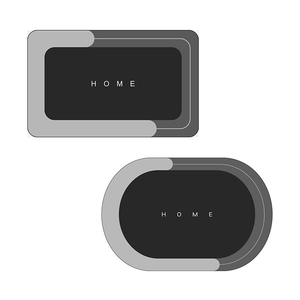 Modern grey Nordic absorbent bath mats in rectangular and oval shapes with HOME text