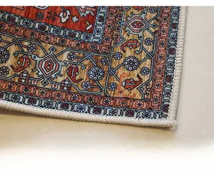 Close-up of Persian style rug showing reinforced edges and vintage geometric patterns