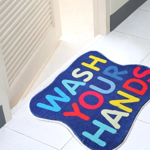 Navy blue faux cashmere bathroom mat with colorful 'WASH YOUR HANDS' text and non-slip back