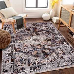Detail of bohemian retro rug with complex geometric patterns and traditional fringe edge