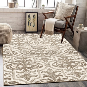Close-up of beige and taupe Damask pattern on a woven Nordic abstract area rug