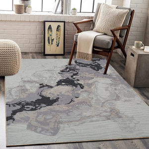 Detailed view of modern abstract ink pattern rug with thick texture and clean edges