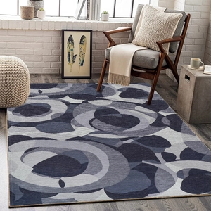 Detailed view of modern abstract geometric rug with blue and grey overlapping circles