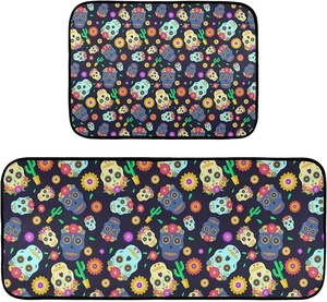 Detailed top view of a 2-piece Day of the Dead kitchen mat set with skull patterns