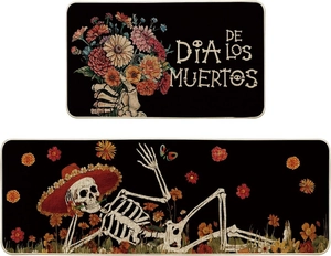 Macro shot of two Day of the Dead mats with skull patterns and floral print decorations