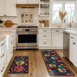 Kitchen mat set with colorful Day of the Dead skull patterns on modern wood floor