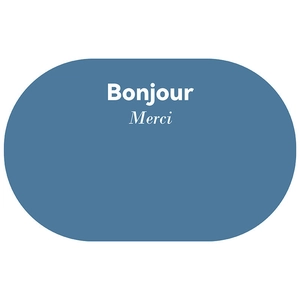 Detail view of the soft blue oval mat featuring white Bonjour and Merci printed text