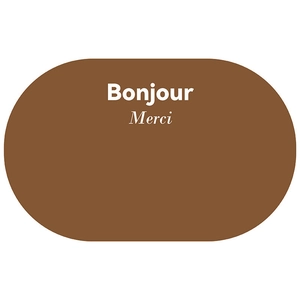 Close-up of brown oval bathroom mat featuring white Bonjour and Merci lettering