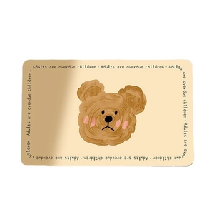 Rectangular khaki bath mat with cute cartoon bear and decorative English lettering