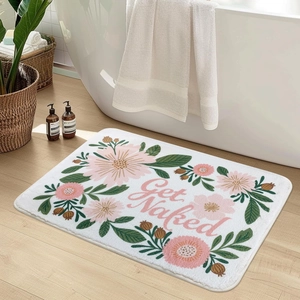 Floral cashmere-like bath mat with Get Naked text and pink flower patterns
