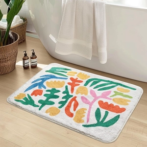 Close-up of floral faux cashmere bath mat texture with colorful abstract plant pattern