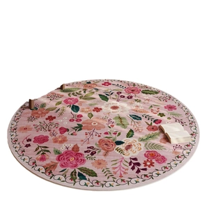 Round faux cashmere floral rug with pink roses and soft pastel leaves for home decor